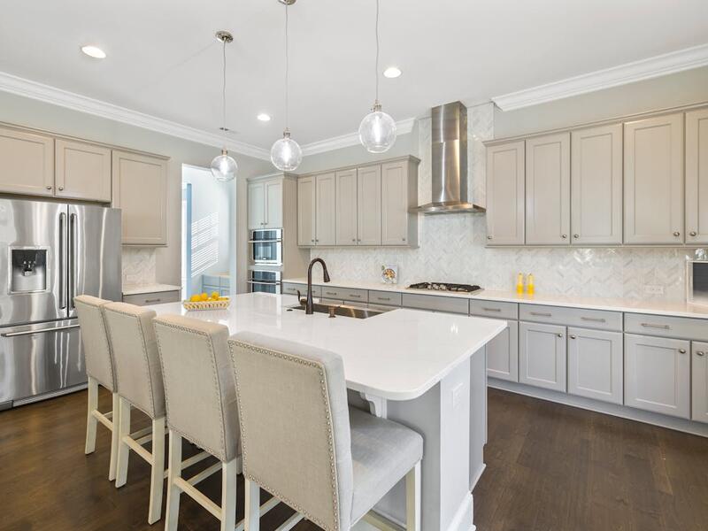 White shaker kitchen with gold hardware, Durham kitchen remodel by Ridgeway